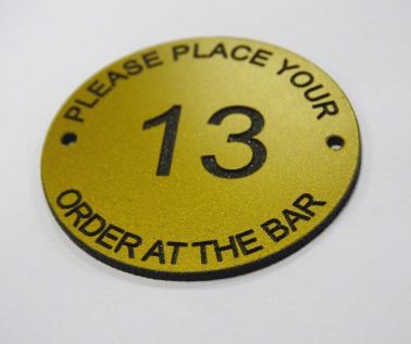 An image of Brass Effect Table Numbers - 70mm - Order at the bar