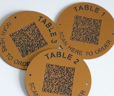 An image of Matte Brass Effect QR Code Table Numbers - 50mm