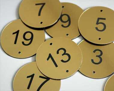 An image of Brushed Brass Effect Table Numbers - 30mm