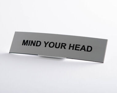 An image of Mind Your Head Sign