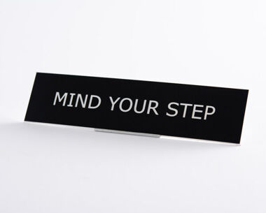 An image of Mind Your Step Sign