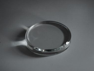 An image of Circular Glass Paperweight with Bevelled Edge