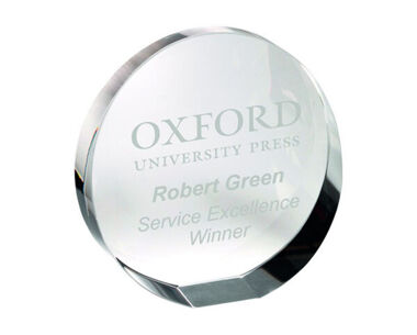 An image of Free-Standing Round Glass Paperweight