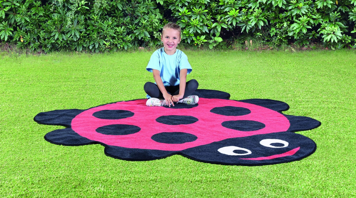 An image of Back To Nature Ladybird Shaped Outdoor Play Mat